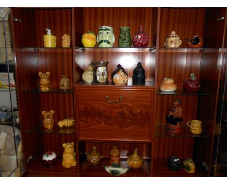 A quantity of ceramic lidded conserve and pickle pots