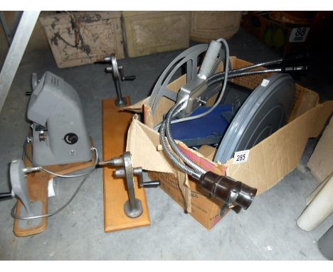 A vintage film projector, screen etc