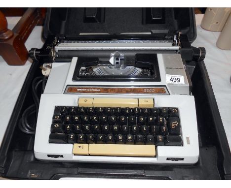 A cased Smith Corona portable typewriter