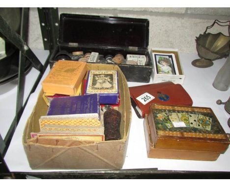 A mixed lot of playing cards, draughts etc