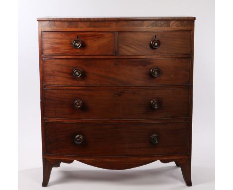 Victorian mahogany and marquetry inlaid bow front chest of two short and three long drawers, above a shaped apron and bracket