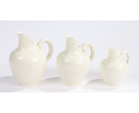 Graduated set of three Royal Worcester white porcelain jugs, registration number 29115, the tallest 14cm high (3)