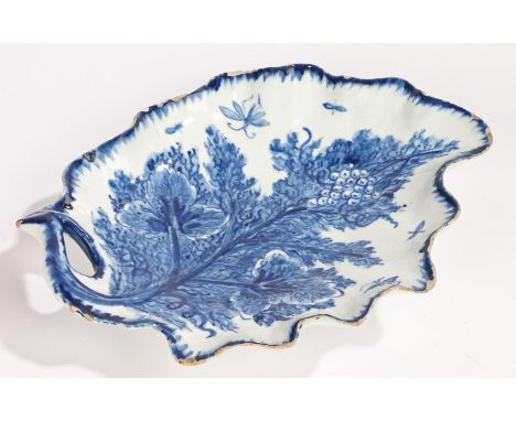 Bow pickle dish, of leaf form, with blue and white foliate and insect decoration, 20cm wide