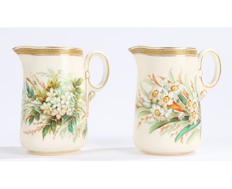 Pair of Royal Worcester jugs, with gilt rims and handles, the bodies decorated with flowering branches, 13cm high