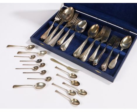 Silver and silver plated flatware, to include tablespoons, teaspoons, table forks, dessert forks etc. all housed in a blue ca