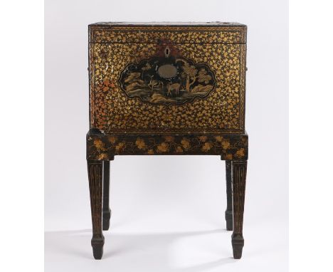 Chinese Qing dynasty lacquered cabinet on stand, early 19th Century, the hinged lid with a central scene in gilt of beasts in