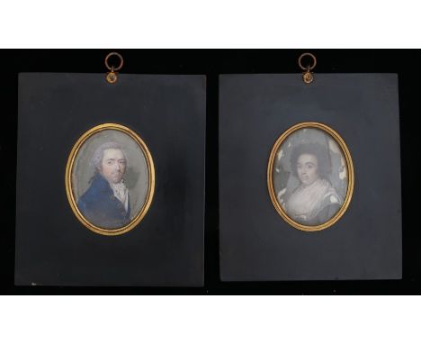 Pair of 19th Century portrait miniatures, of a gentleman in blue coat and a lady in white, 50mm x 65mm