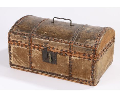 19th Century hide covered trunk, with a swing handle to the arched top and stud work straps above the conforming base, 46cm w