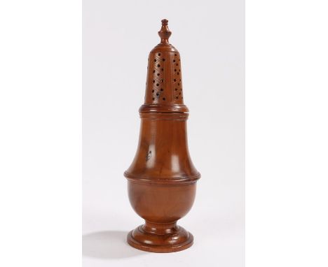Turned yew wood castor, with a finial top above the pierced holes and baluster body, 17.5cm high 