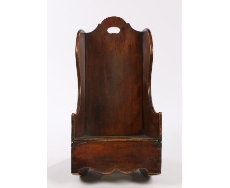 19th Century child's rocking chair, the arched top above a panel back and sides with commode hole to the base, 68cm high