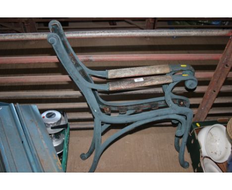 A pair of wooden and metal bench ends 