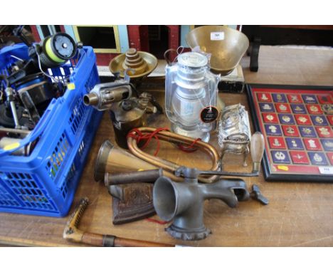 A set of brass scales and weights; a brass blow lamp; as new lantern; a brass horn; a mincer; a flat iron etc
