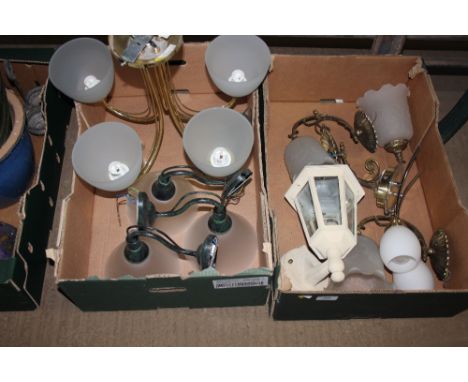 Two boxes containing various light fittings 
