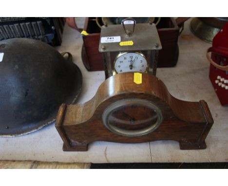 A brass anniversary clock together with an oak cased mantle clock