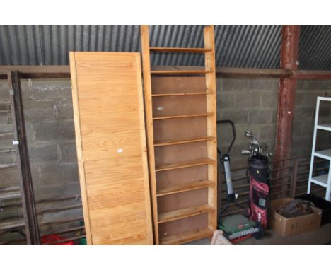 A pine open fronted shelf together with a door