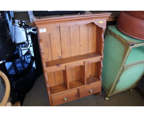 A pine hanging shelf fitted two drawers 