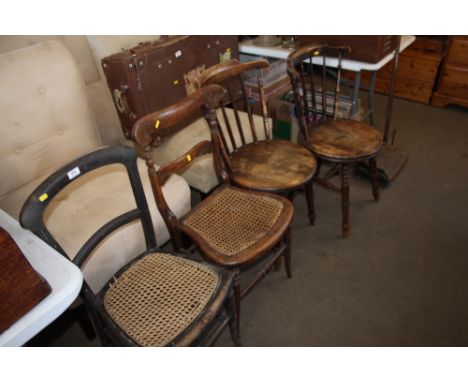 A pair of stick back dining chairs together with two other chairs 