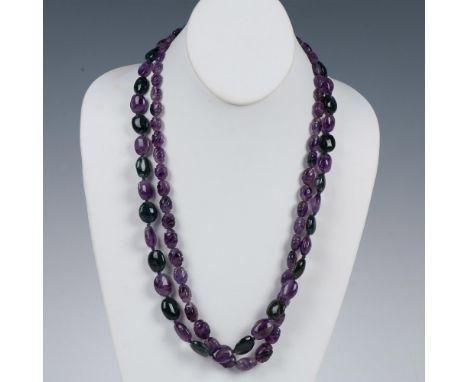 The first necklace measures 24.75"L and has smooth amethyst and moss agate beads secured with a lobster claw clasp. The secon