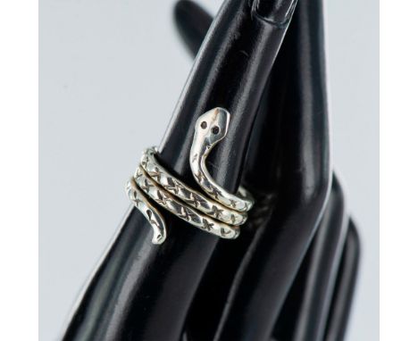 Native American style snake shaped sterling silver ring. Stamped DO K Sterling. Size 6.75. Condition: Age related wear.