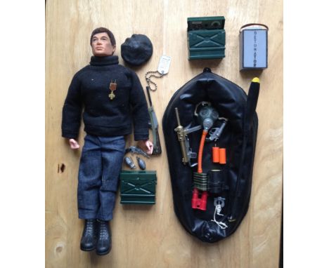 A 1964 model flock haired Action Man in French Resistance Fighter uniform #34113 with a Sabotage Set #34118 - unboxed. Includ