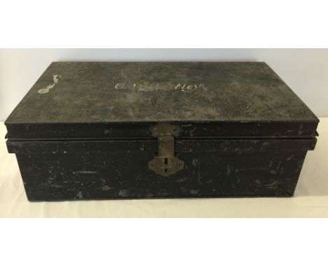 Vintage black tin trunk, approx 68cm x 38cm x 23cm.