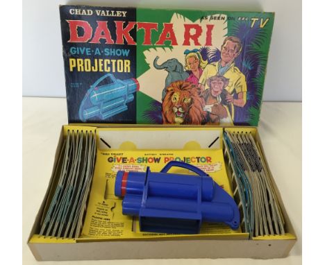 A boxed Chad Valley 'Daktari' give a show projector complete with slides and additional Disney Jungle Book slides.