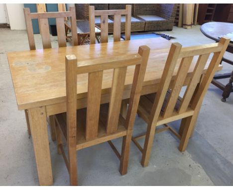 A light wood kitchen table & 4 chairs. 152cm x 80cm.