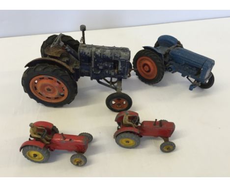 Large scale vintage diecast wind-up Fordson tractor together with 2 Dinky Massey Harris tractors and another.