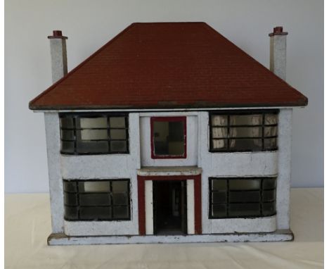 A vintage c.1930s style dolls house with lights, open back and sliding front.