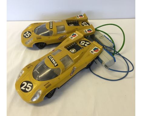 2 c1970s West German Gama remote control Porsche Le Mans racing cars.
