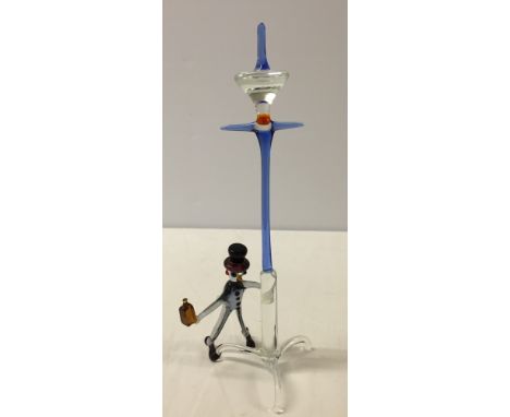 Murano glass ornament of a drunken man in a top hat underneath a gas light. Approx 20cm tall.