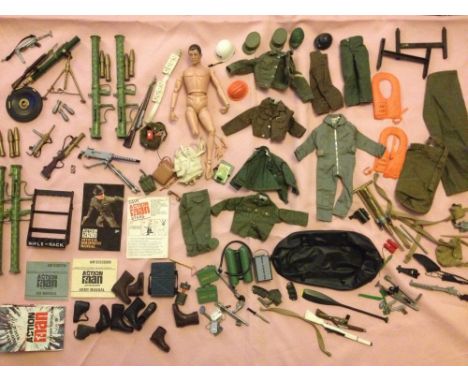 A 1964 model Action Man & accessories including bazookas, mortar, machine guns, dingy, booklets, uniforms, radios, and other 