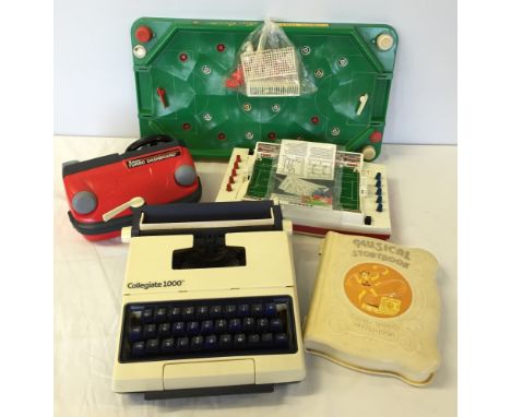 A quantity of toys and games to include football games, a Tomy Turnin' Turbo Dashboard and a Collegiate 1000 typewriter.