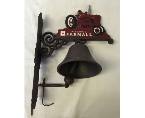Cast iron painted tractor outdoor wall mount bell.