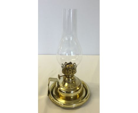Brass fixed handle oil lamp.