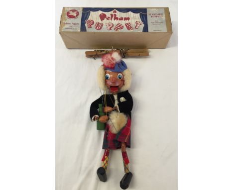 A c1950s Pelham puppet 'McBoozle' in original box.