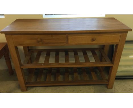 A light oak 2 drawer & 2 shelf unit. 119cm wide x 80cm tall x 45cm deep.