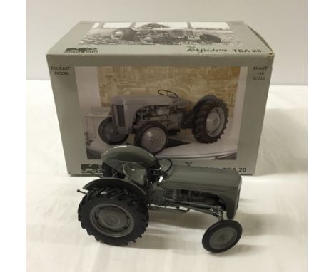 A boxed Ferguson TEA 20, 1:16 scale tractor.