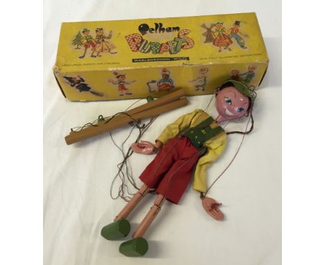 A boxed Pelham Puppet boy.