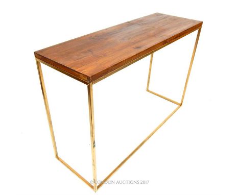 A contemporary gilt metal console table, having a rectangular stained pine top, 79 x 120 x 40cm.