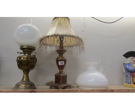 A brass oil lamp, a table lamp and an oil lamp shade. (Collect only)