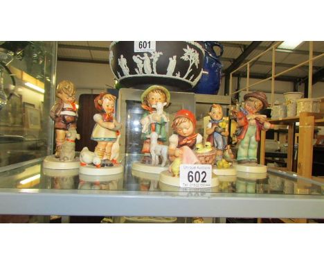Six vintage Goebel figures including Little Fiddler, Shepherd Boy etc.,