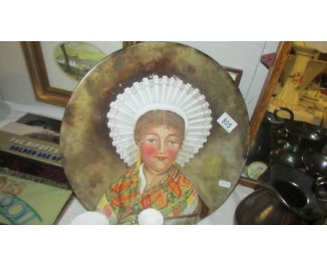 A large continental charger with a portrait of a lady.  (Collect only)