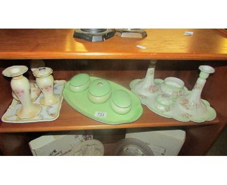 Three china trinket sets.