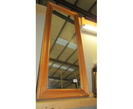 A tall pine framed mirror.  (Collect only)
