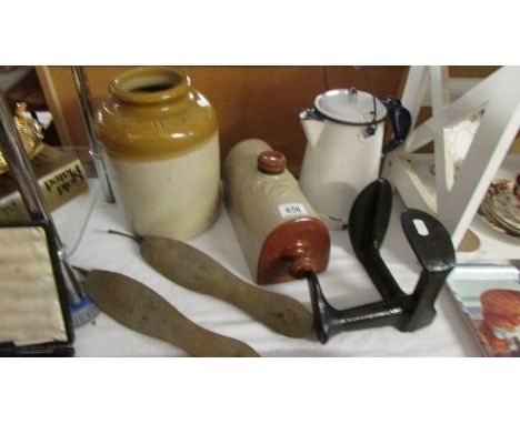 An enamel lidded jug, a stoneware jar, a stone ware foot warmer, shoe lasts etc.,