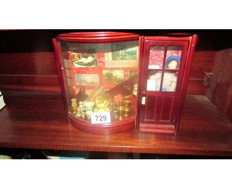A vintage shop diorama (parts loose inside).