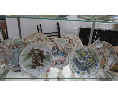 Five Royal Worcester Christmas plates and two WWF Bradex bird plates.