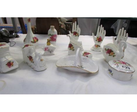 A mixed lot of rose decorated ornaments including Spode and Royal Worcester.