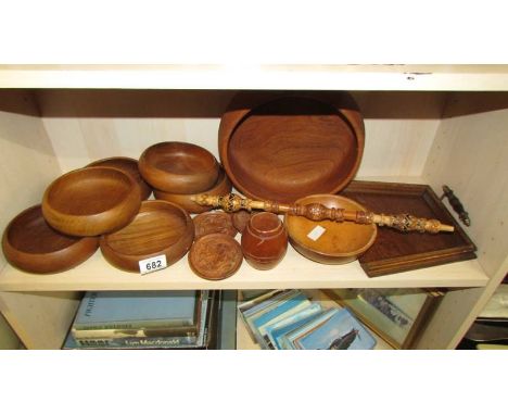 A shelf of wooden bowls etc.,